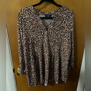 Orange, black and white spotted blouse